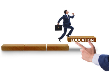 Education concept with businessman on steps