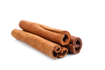 Natural cinnamon sticks on white background