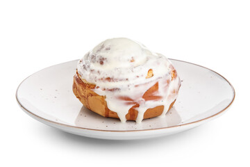 Plate of tasty cinnamon roll with cream on white background