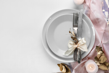 Beautiful table setting for wedding celebration on white background