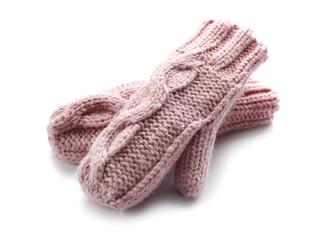 Knitted mittens on white background, closeup