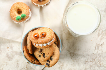 Funny cookies with milk on grunge background