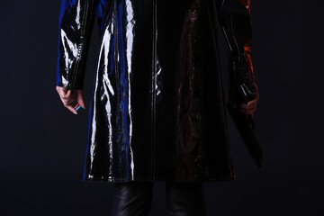 Woman with blue and red pills on dark background. Concept of choice