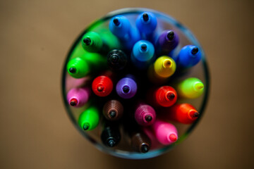 Collection colored sketch pens shot from above.