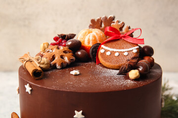 Tasty Christmas chocolate cake on light background, closeup