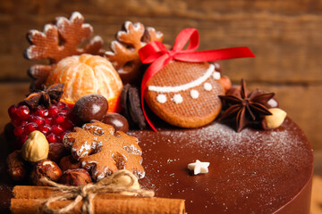 Tasty Christmas chocolate cake on table, closeup