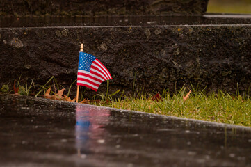 american flag on a grave