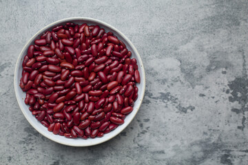 Grains Red bean in bowl put on concrete background