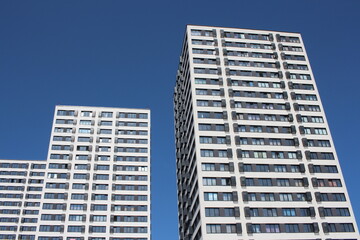 Fototapeta na wymiar modern metropolis houses multi-storey buildings with a facade in the windows
