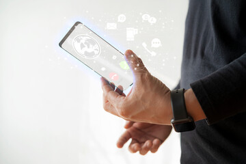 Man's hands use futuristic glass phone with latest modern holographic technology.