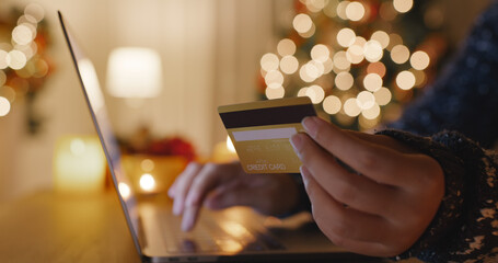 Merry Xmas eve online shopping store. Close-up hand asia people happy order buy on boxing day sale...