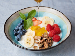 Porridge with fruits, berries, nuts.