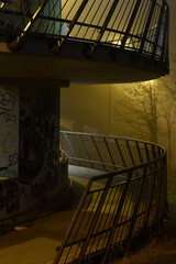 street lights under a concrete bridge in the fog in the city of Prague at night 2021