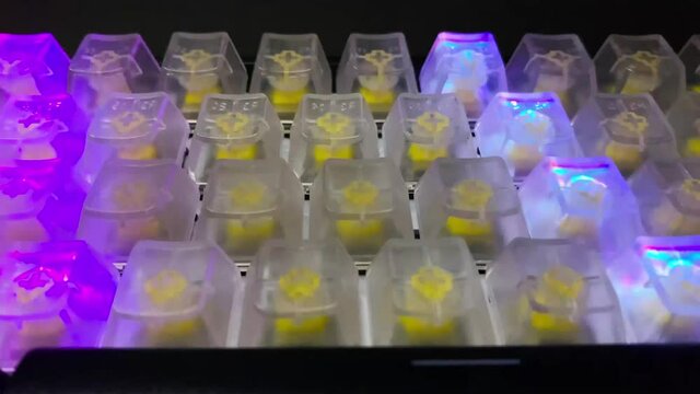 Gaming RGB LED backlit keyboard on black background.
