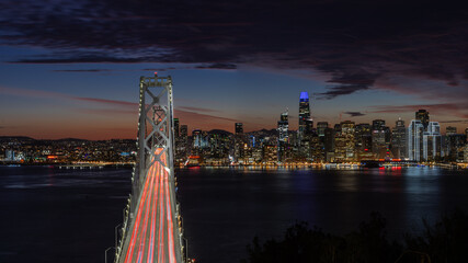Fototapeta na wymiar Bay Bridge and the city by the bay skyline at night 