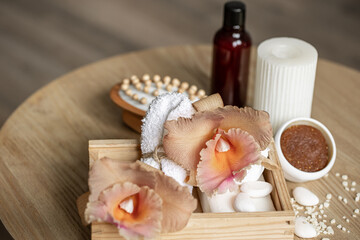 Spa composition with Thai orchid flowers and bath accessories.
