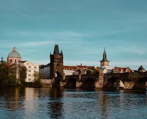 Fototapeta na wymiar Panoramic view of Charles Bridge on the Vltava river in the center of Prague on a sunny day 2021 during storm