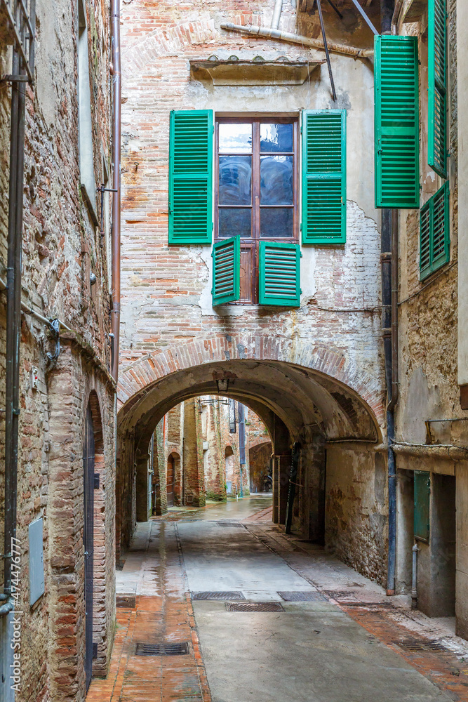 Poster Italian back street in a city with a vault