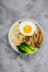 Noodles Soup with Fish Balls on wood table