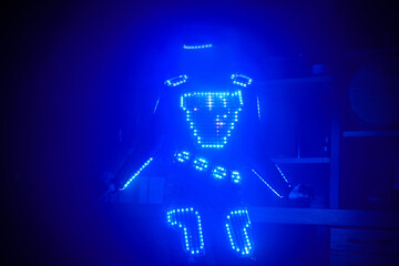 Diode light dance show in blue shadows.