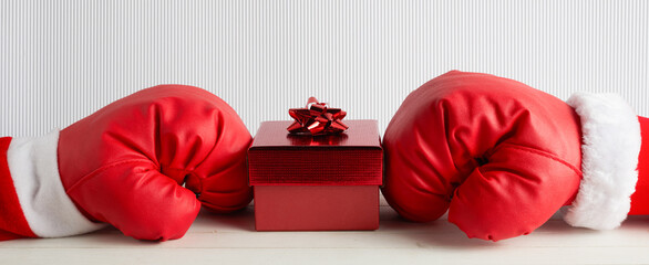 Boxing day shopping creative idea. Boxing glove with gift box.