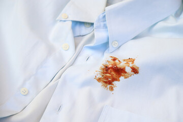 dirty barbeque sauce stain on cloth from daily life activity for cleaning concept. housework care...