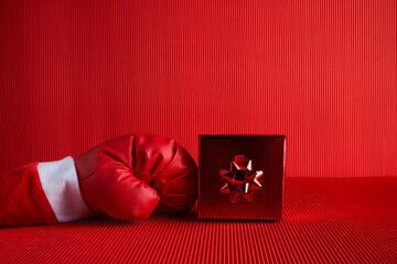 Boxing day shopping creative idea. Boxing glove with gift box.