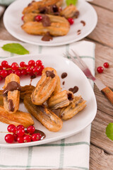 Mini churros with chocolate dipping sauce.