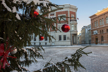 Close-up on Christmas tree and street on a winter day. Riga. Latvia.The Baltic States.