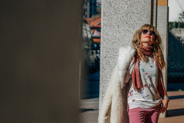 Obraz premium woman in coat on the street outdoors