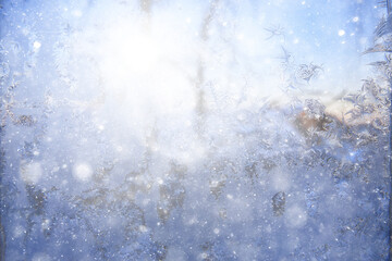 frost patterns on window glass, abstract background winter rime snow