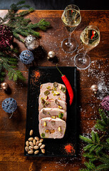 Christmas antipasti meat loaf made of chicken terrine,