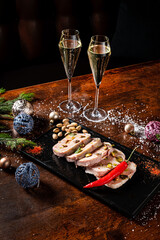Christmas antipasti meat loaf made of chicken terrine,