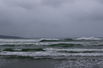 Waves spray. Dramatic seascape and cloudscape views. Black Sea Coastline in autumn season.