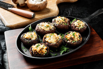 Baked mushroom caps stuffed with chicken meat, parmesan cheese, garlic and herbs.