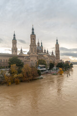 Sunset at the Puente de Piedra next to the Basilica De Nuestra Señora del Pilar on the Ebro river in the city of Zaragoza, Aragon. Spain