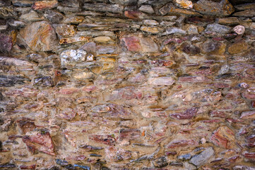 Closeup a brick wall of an ancient castle