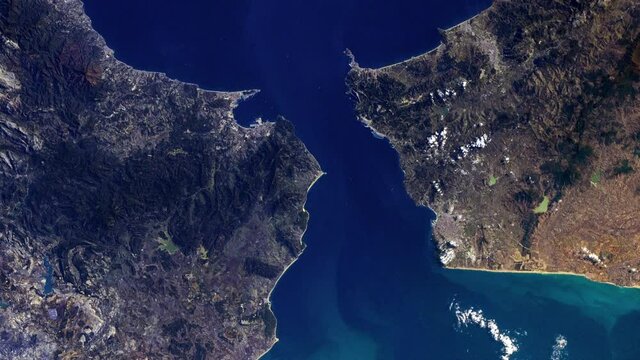 Strait of Gibraltar border between Europe and Africa, Mediterranean sea and Atlantic ocean aerial satellite view from space, sunrise animation. Based on image furnished by Nasa