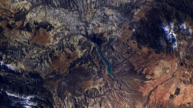 Embalse de Negratin Spain lake water resource aerial satellite view from space, sunrise animation. Based on image furnished by Nasa