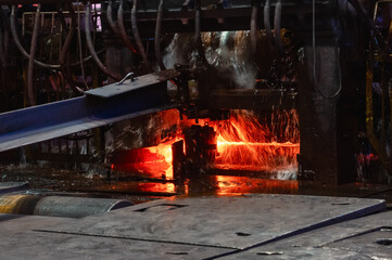 The rolling mill in operation. Manufacturing of hot rolled steel