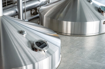 Mash vats of a brewery. Large metal fermentation tanks