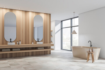 Corner view on bright bathroom interior with two sinks, bathtub