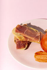 Traditional Spanish Iberian Serrano Ham with Tomato