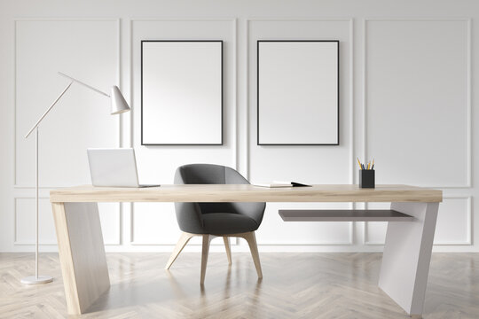 Two empty mockup canvases in white minimalist office
