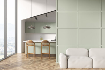 Light kitchen interior with sofa and seats, kitchenware and window