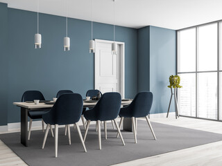 Corner view of blue and white dining room
