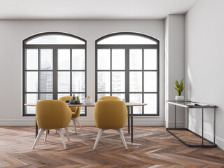 White and wooden dining room interior with dishes, coffee table and window