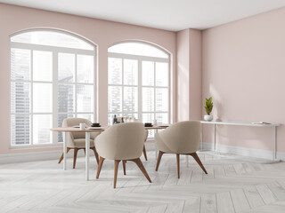 Fototapeta premium Light pink and white dining room with arch windows