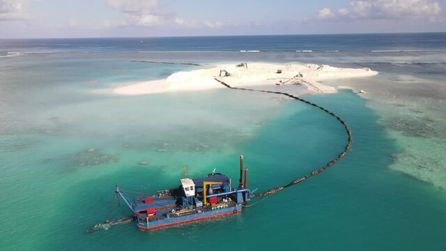 Drone shot of Harvesting salt in Indian Ocean in the Maldives 