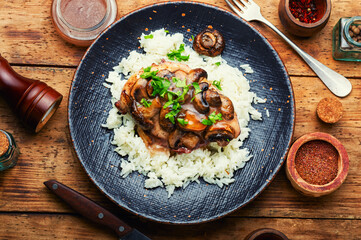 Chicken breast with marsala sauce and rice